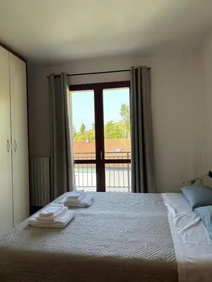 Letto o letti in una camera di B&B Gioia