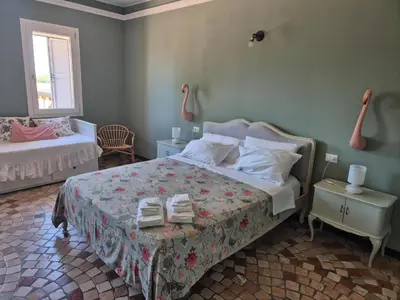 Letto o letti in una camera di Al Civico 73