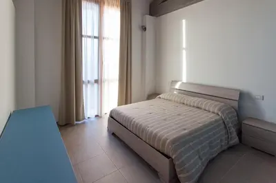 Letto o letti in una camera di Agriturismo Mascudiera