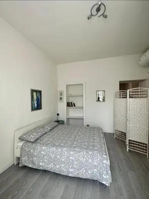 Letto o letti in una camera di Notte Tempo