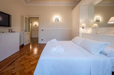 Letto o letti in una camera di RAPALLO BEACH HOUSE A due passi dal mare