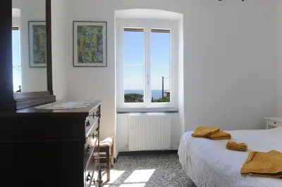 Letto o letti in una camera di Casa Franguella - Uliveto sul mare