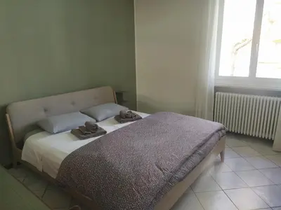 Letto o letti in una camera di Civico 21-FreeParking