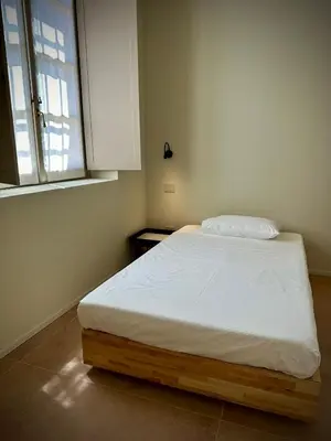 Letto o letti in una camera di Grey-Fontanelli Luxury Suite Reggio Emilia