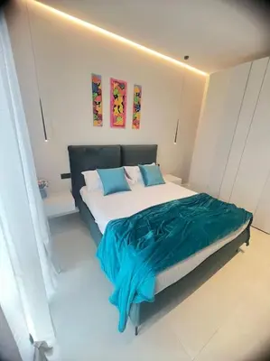 Letto o letti in una camera di UrbanSuite Il Nido Guest House