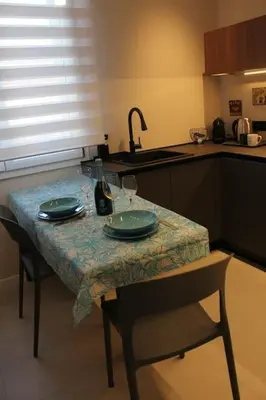 Cucina o angolo cottura di UrbanSuite Il Nido Guest House