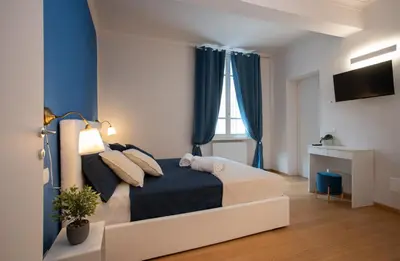 Letto o letti in una camera di Suites Appartamento 2 bagni - Freedom SUITES