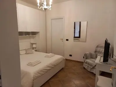 Letto o letti in una camera di Livia's House - Vezzano Ligure vicino Cinque 5 terre