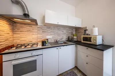 Cucina o angolo cottura di CASA FRANCESCA Luminoso, Wifi e Parcheggio