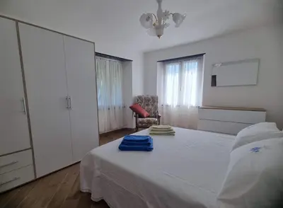 Letto o letti in una camera di Casa Nonna Maria - Val Fontanabuona