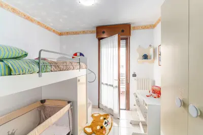 Letto o letti in una camera di Gandens Flat