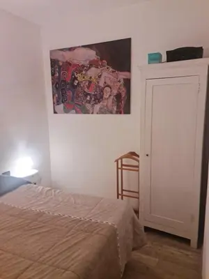 Letto o letti in una camera di Bilocale vicinissimo 50m mare