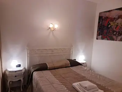 Letto o letti in una camera di Bilocale vicinissimo 50m mare