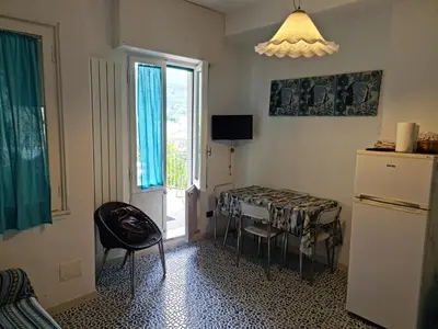 TV o dispositivi per l'intrattenimento presso Bilocale vicinissimo 50m mare