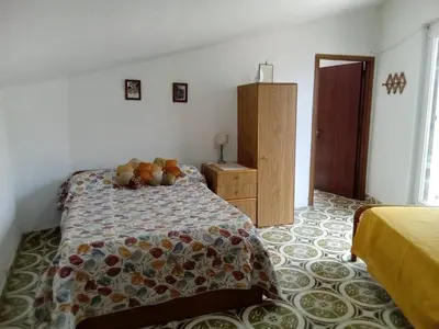 Letto o letti in una camera di Casa vacanza toscana