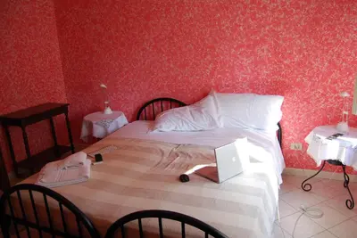 Letto o letti in una camera di Le Querce