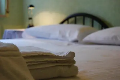 Letto o letti in una camera di Le Querce
