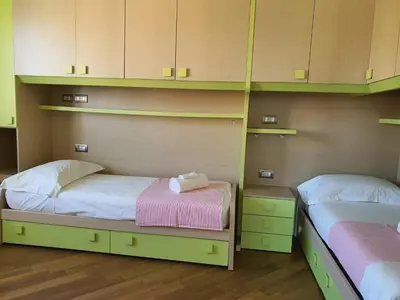 Letto o letti in una camera di Elisa House