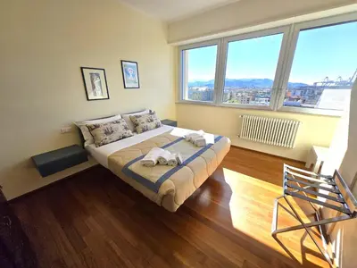 Letto o letti in una camera di Appartamento Decimo Cielo Vista Mare