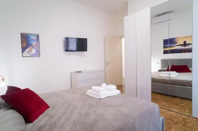 Letto o letti in una camera di Casa vacanze Dream&Fly