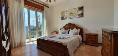 Letto o letti in una camera di Casa Vacanze Nonna Papera near Cinque Terre