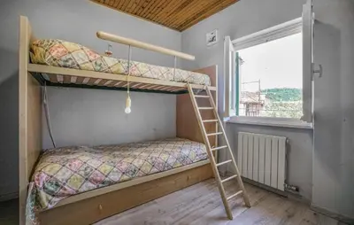 Letto o letti in una camera di Awesome Apartment In Carro With Wifi