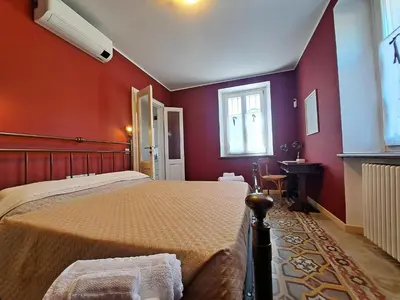 Letto o letti in una camera di Casa Ninì - Holidays in Oltrepo