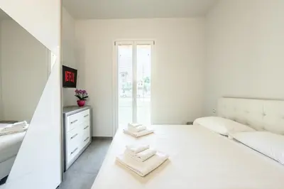 Letto o letti in una camera di Villa Turrini