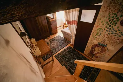 Letto o letti in una camera di Alloro casa storica