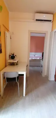 Letto o letti in una camera di B8 Parma