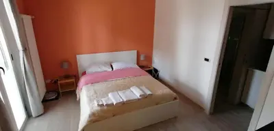 Letto o letti in una camera di B8 Parma
