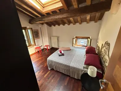Letto o letti in una camera di B&B Corte Bassa 2