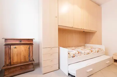 Letto o letti in una camera di Casa Dante