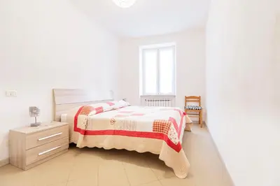 Letto o letti in una camera di Casa Dante