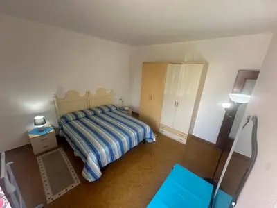 Letto o letti in una camera di Appartamenti vista Corte con Giardino - Arena Po - Pavia