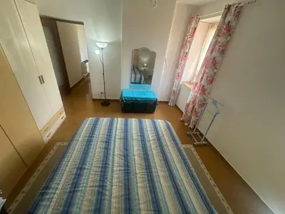 Letto o letti in una camera di Appartamenti vista Corte con Giardino - Arena Po - Pavia