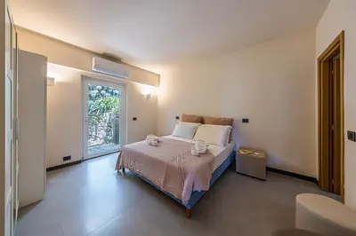 Letto o letti in una camera di VILLA DUFOUR 2 Lusso, Piscina e Vista da Sogno