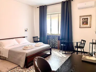 Letto o letti in una camera di Casa Margherita