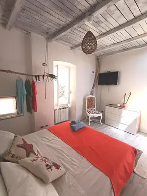Letto o letti in una camera di Casa Martina