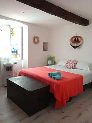 Letto o letti in una camera di Casa Martina