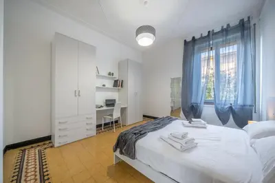 Letto o letti in una camera di FERRARI - Stazione e centro città