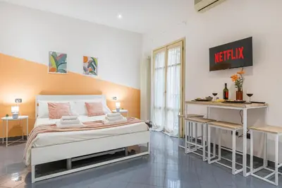 Letto o letti in una camera di VISTA DUOMO, 4 persone, WiFi, Aria condizionata, Smart TV