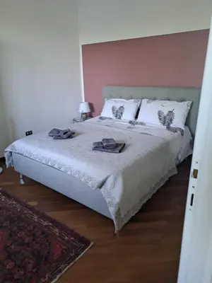 Letto o letti in una camera di Il Paradiso all'improvviso