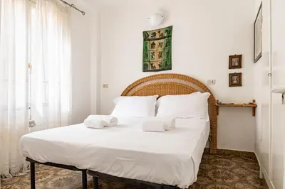 Letto o letti in una camera di GuestHost - Monterosso al Mare! Seaview Flat