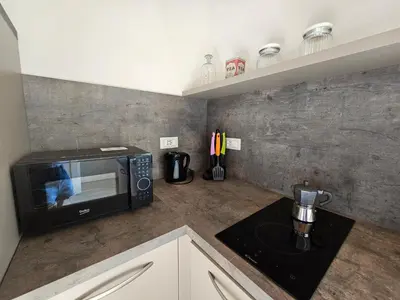 Cucina o angolo cottura di Patrizio Apartments-by Goccia di Lago