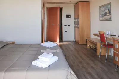 Letto o letti in una camera di Planet Hotel