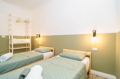 Letto o letti in una camera di H H Moneglia il Vicolo