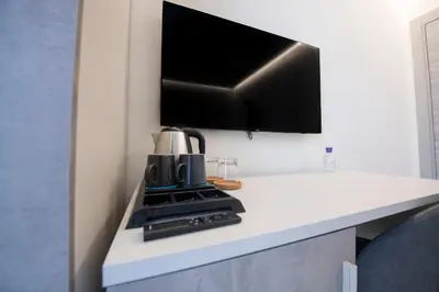 Cucina o angolo cottura di 240b - Camera Nord - Affittacamere Sara Home Chiavari, 200Metri dal Mare - BAGNO PRIVATO MA FUORI DALLA STANZA
