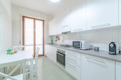 Cucina o angolo cottura di GuestHost - Mare e Monti Vacation Flat