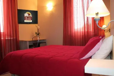 Letto o letti in una camera di Room & Breakfast A casa di Emma